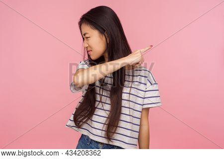 Get Out, Leave Me, Portrait Of Irritated Dissatisfied Brunette Girl In Striped T-shirt Showing Way O