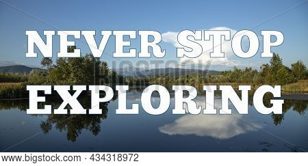 Inspirational Motivational Quote Never Stop Exploring, On Beautiful Lake And Mountain Landscape Back