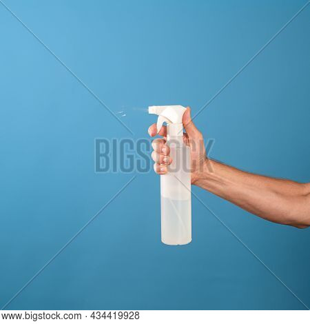 Do The Cleaning Of The House, A Call For Cleanliness And Order, A Mans Hand Holds A Cleaning Agent W