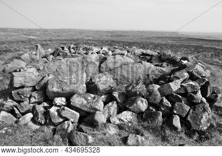Exposed Stones At The Top Of A Cairn Known As The Millers Grave On Midgley Moor In Calderdale West Y