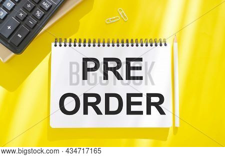 Hand Writing The Text: Pre-order, Business Concep, Yellow Background