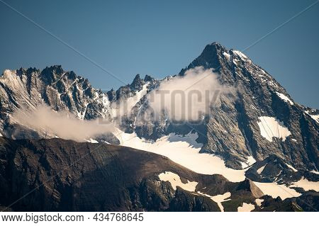 The Grossglockner In The Center Of The National Park Hohe Tauern, Highest Mountain Of Austria, Sunny