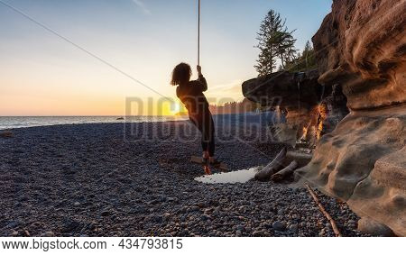 Adventurous White Caucasian Woman At Sandcut Beach On The West Coast Of Pacific Ocean. Summer Sunny 