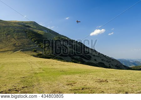 Hang Glider Just After Launch From Monte Cucco Regional Park, Umbria, Italy