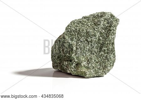 Stone, A Fragment Of Jadeite On A White Background