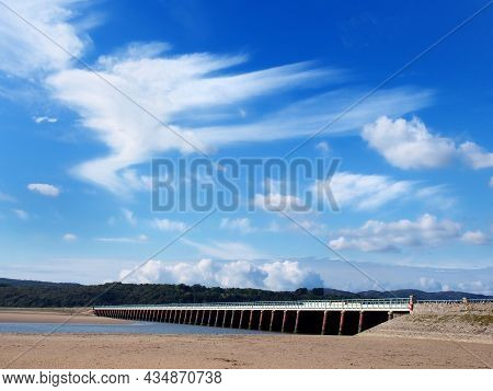 View Of The Beach At Arnside With The Leven Railway Viaduct And River In The South Lakes Area Of Cum