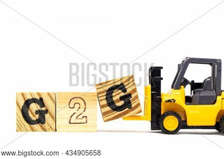 Toy Forklift Hold Letter Block G To Complete Word G2g (abbreviation Of Government To Government) On 