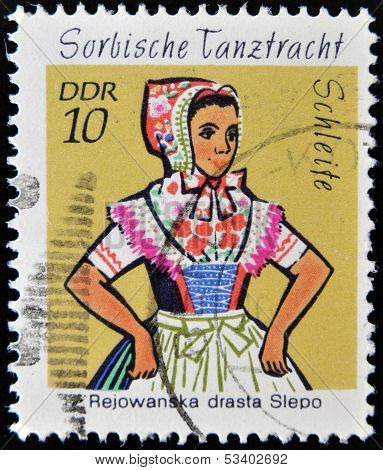 EAST GERMANY- CIRCA 1971: stamp printed in Germany shows Dance Costume Schleife