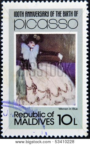 stamp printed in Malldives Islands shows woman in blue by Pablo Ruiz Picasso