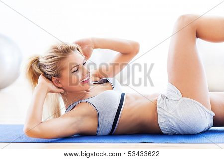 Woman doing sit-ups