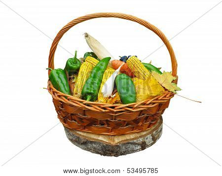 Corn Vegetables And Yellow Leaves In Basket Isolated On White