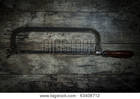 Rusty Sawback For Metal On The Wooden Background Construction Instruments On The Wooden Background