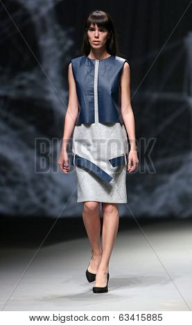 ZAGREB, CROATIA - APRIL 10 : Fashion model wears clothes made by Petra Vuletic and Sasa Hortig on 