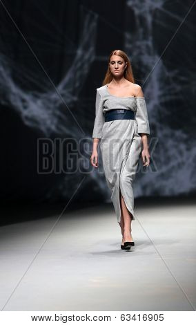 ZAGREB, CROATIA - APRIL 10 : Fashion model wears clothes made by Petra Vuletic and Sasa Hortig on 
