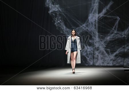 ZAGREB, CROATIA - APRIL 10 : Fashion model wears clothes made by Petra Vuletic and Sasa Hortig on 