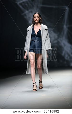 ZAGREB, CROATIA - APRIL 10 : Fashion model wears clothes made by Petra Vuletic and Sasa Hortig on 