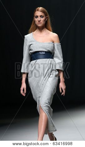 ZAGREB, CROATIA - APRIL 10 : Fashion model wears clothes made by Petra Vuletic and Sasa Hortig on 