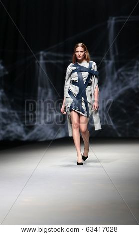 ZAGREB, CROATIA - APRIL 10 : Fashion model wears clothes made by Petra Vuletic and Sasa Hortig on 