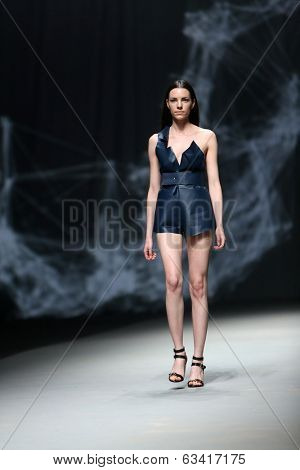 ZAGREB, CROATIA - APRIL 10 : Fashion model wears clothes made by Petra Vuletic and Sasa Hortig on 