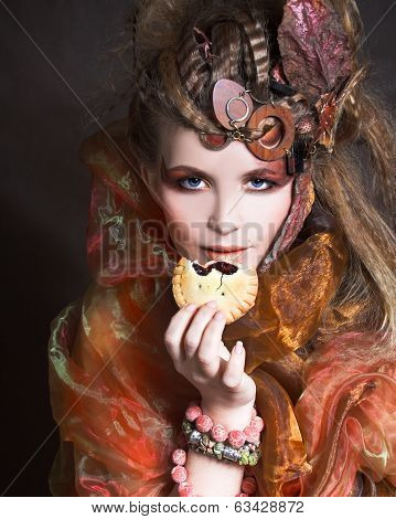 Stylish lady with cake