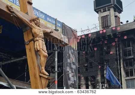 KIEV, UKRAINE - APR 7, 2014: Second crucifixion of Jesus.Burned downtown of Kiev.Rioters camp. Putsch of junta in Kiev and Western Ukraine.April 7, 2014 Kiev, Ukraine