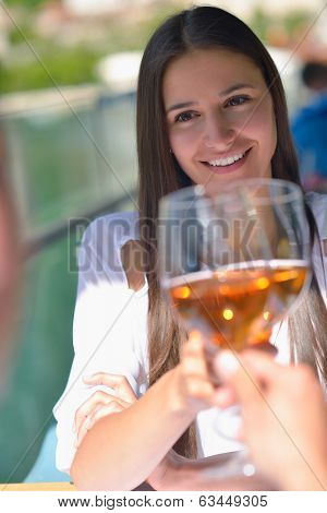 happy young couple having lanch at beautiful restaurant on by the sea on  beach