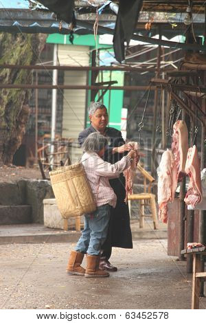Local butcher in Luodai village Chengdu China