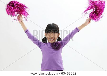 Happy chinese girl holding pom pom