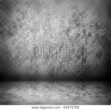 Abstract stonework background texture with old weathered dark stucco black paint stone cement wall in rural room Grungy cold rock surface in hard grime empty place with niello granite dull light floor