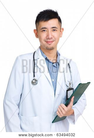 Asian doctor holding clipboard