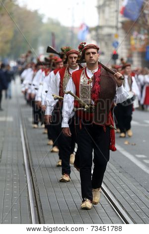 ZAGREB, CROATIA - OCTOBER 04: The parade of 70 participants, thirty horses and forty members of a brass band to the main square were announced next, 300th Sinjska Alka, on October 04, 2014 in Zagreb.