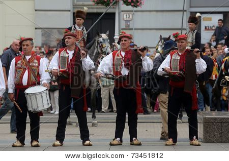 ZAGREB, CROATIA - OCTOBER 04: The parade of 70 participants, thirty horses and forty members of a brass band to the main square were announced next, 300th Sinjska Alka, on October 04, 2014 in Zagreb.