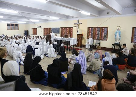 KOLKATA, INDIA - FEBRUARY 15: Sisters of Mother Teresa's Missionaries of Charity and volunteers from around the world at the Mass in the chapel of the Mother House, Kolkata, India at February 15,2014.