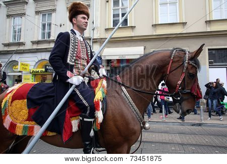 ZAGREB, CROATIA - OCTOBER 04: The parade of 70 participants, thirty horses and forty members of a brass band to the main square were announced next, 300th Sinjska Alka, on October 04, 2014 in Zagreb.