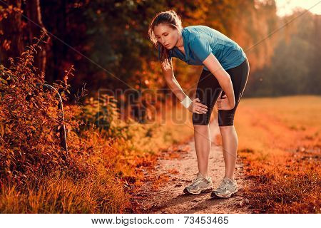 Young Athletic Woman Taking A Break From Training