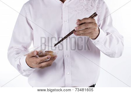 Man With Chopsticks Eat Egg Springroll