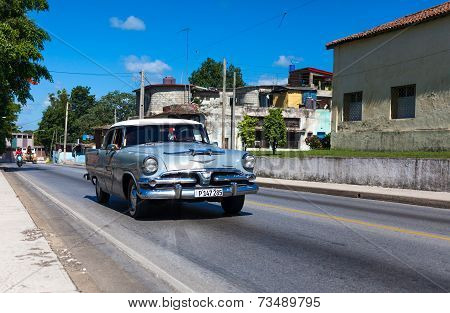 HAVANA,CUBA - June 27, 2014: Silver classic car on the road in havana