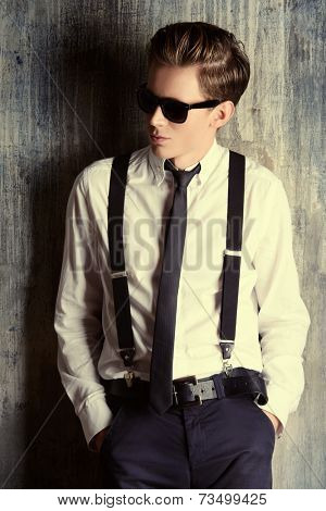 Fashion shot of a handsome young man. Studio shot.