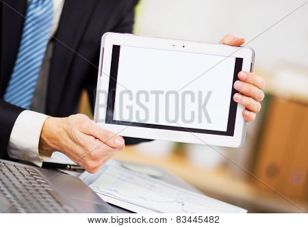 Businessman hands are holding the touch screen device.