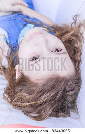 Child Lying Upside Down