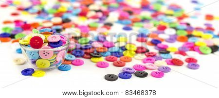 Heap Of Colorful Clasper On White
