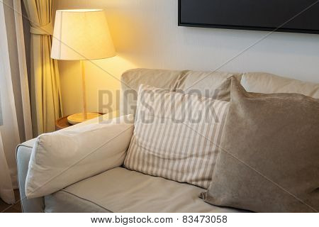 Modern Living Room Design With Sofa And Wooden Lamp
