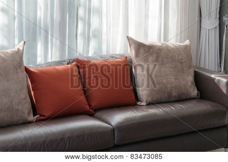 Modern Living Room Design With Sofa And Red Pillows