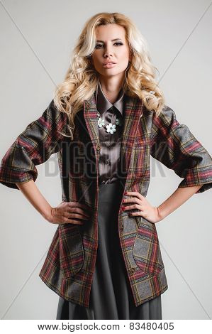The model comes on the catwalk during a fashion show.