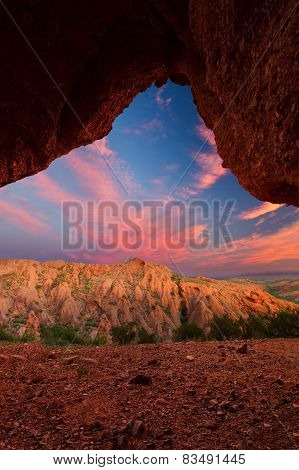 Red Rock Mountain With Arch Sunset Clouds Near Calitzdorp In South Africa
