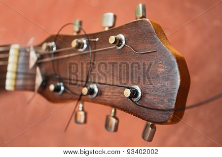 guitar on a brown background