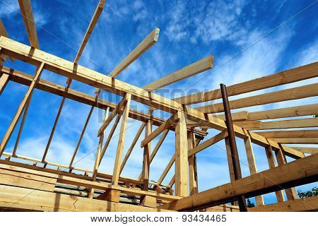 Installation Of Wooden Beams At Construction Of The Frame House