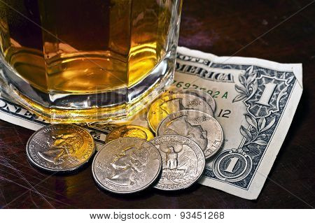 Tip Money Left On Counter Under Drink