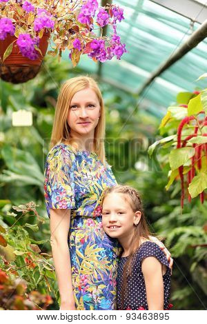 young mother with daughter in park