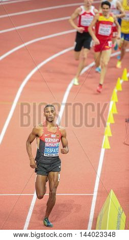 PRAGUE, CZECH REPUBLIC - MARCH 7, 2015: Homiyu Tesfaye (#179 Germany) compets in the men's 1500m event of the European Athletics Indoor Championship.